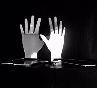 An abstract expression, this modern set of stainless steel hands are upright yet, also mirrored in their base. Signed by the artist, this piece is laser cut, with a thickness of 5mm solid, and the contour of the piece provides the solid base of the sculpture. Polished and welded by hand, this is a remarkably simple, yet thoroughly sophisticated artwork. Artist: Luiz Campoy Medium: Stainless steel Dimensions: 40 x30 x25cm Signed by the artist: Shipping Worldwide